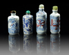 A GROUP OF FOUR CHINESE BLUE AND WHITE 'FIGURAL' SNUFF BOTTLES