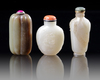 A GROUP OF THREE CHINESE JADE SNUFF BOTTLES
