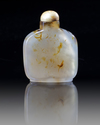 A CHINESE AGATE 'HORSE & MONKEY' SNUFF BOTTLE
