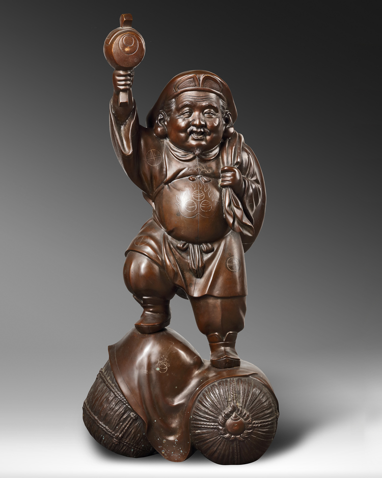 A VERY LARGE AND HEAVY JAPANESE BRONZE FIGURE OF DAIKOKU