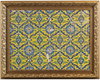 TWELVE YELLOW GROUND SAFAVID TILES MOUNTED IN A FRAME