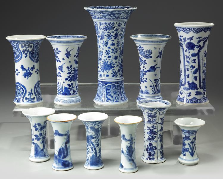 A GROUP OF ELEVEN CHINESE BLUE AND WHITE BEAKER VASES