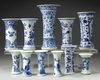 A GROUP OF ELEVEN CHINESE BLUE AND WHITE BEAKER VASES