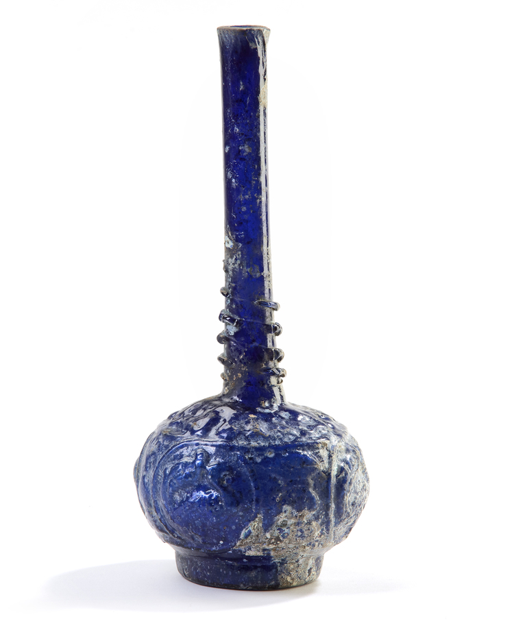 A BLUE GLASS SPRINKLER, PERSIA, 9TH-10TH CENTURY