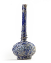 A BLUE GLASS SPRINKLER, PERSIA, 9TH-10TH CENTURY