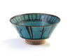 A RAQQA TURQUOISE GLAZED POTTERY BOWL, SYRIA, 13TH-14TH CENTURY