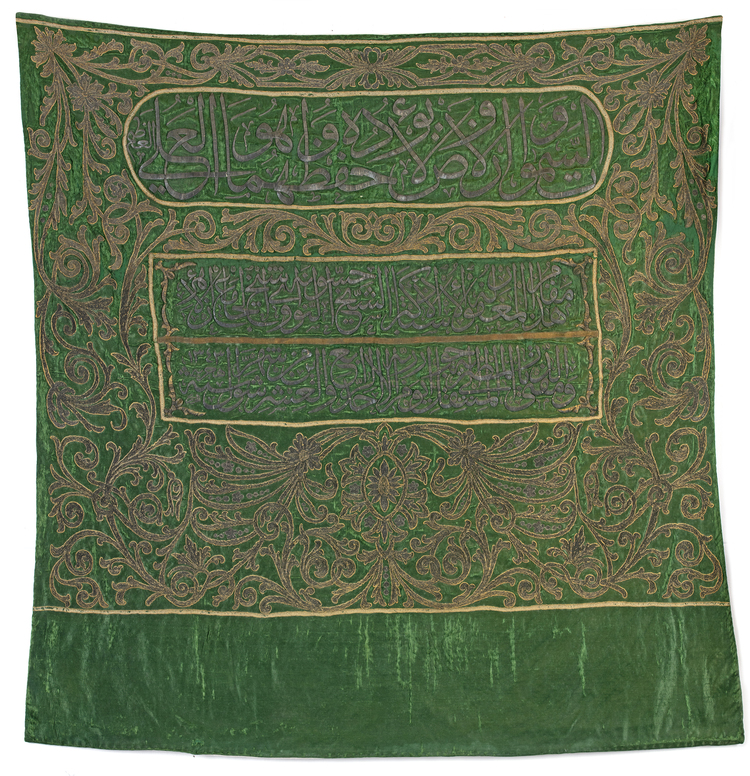 A GREEN GROUND SILK BANNER EMBROIDERED WITH SILVER AND GILT THREAD, EGYPT, 1343 AH/1924 AD