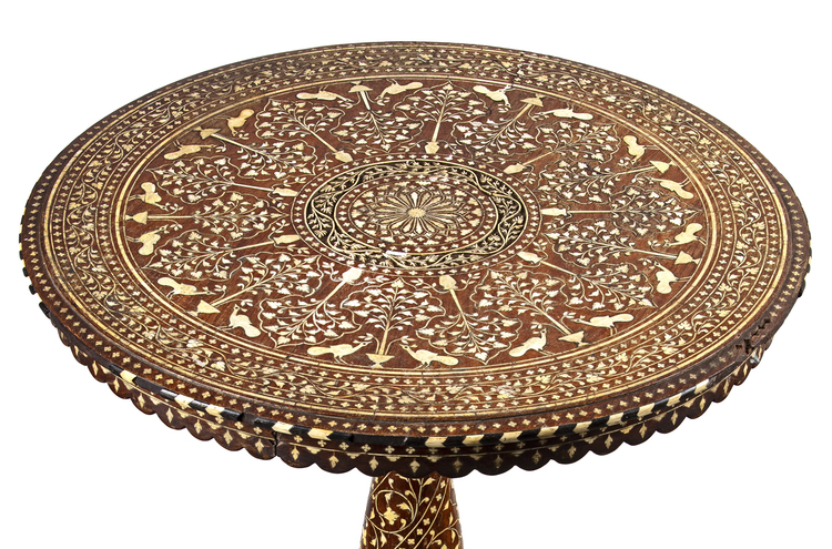 A WOODEN AND BONE INLAID TABLE