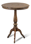 A WOODEN AND BONE INLAID TABLE