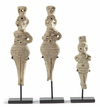 A GROUP OF THREE SYRO-HITTITE TERRACOTTA STYLIZED FEMALE IDOLS, FIRST HALF OF 2ND MILLENNIUM B.C.