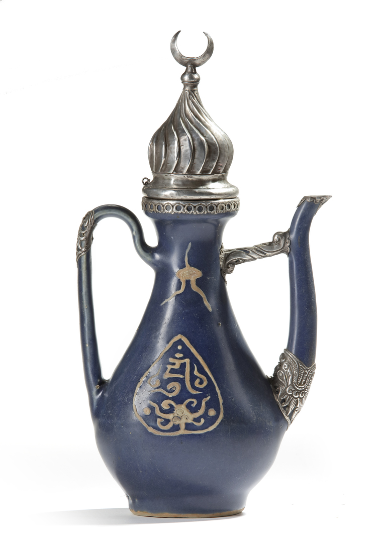 A MING METAL-MOUNTED BLUE-GLAZED EWER FOR THE ISLAMIC MARKET, CHINA, 16TH-17TH CENTURY