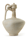 A SELJUK UNGLAZED POTTERY EWER, PERSIA,12TH-13TH CENTURY