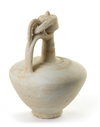 A SELJUK UNGLAZED POTTERY EWER, PERSIA,12TH-13TH CENTURY