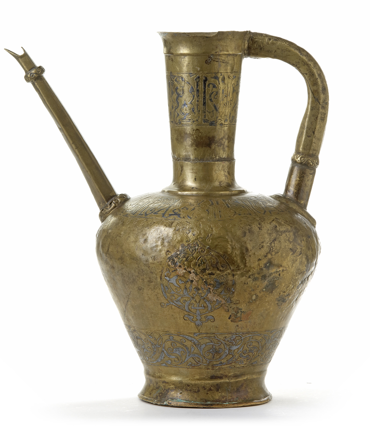 A LARGE NIELLO-INLAID BRASS EWER, CENTRAL-ASIA, 12TH-13TH CENTURY