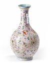 A CHINESE PINK-GROUND FAMILLE ROSE VASE