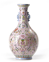 A CHINESE PINK-GROUND FAMILLE ROSE VASE