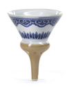 A CHINESE CAFÉ-AU-LAIT GLAZED BLUE AND WHITE FUNNEL