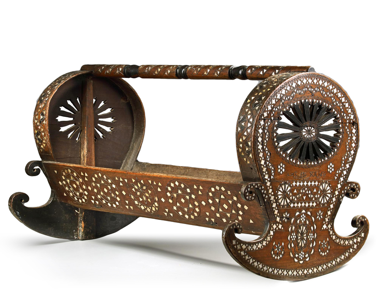 AN OTTOMAN HARDWOOD MOTHER-OF-PEARL AND SILVER WIRE-INLAID CRADLE, TURKEY, 19TH CENTURY