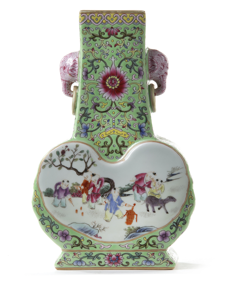 A CHINESE GREEN-GROUND FAMILLE ROSE VASE