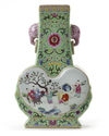 A CHINESE GREEN-GROUND FAMILLE ROSE VASE