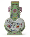 A CHINESE GREEN-GROUND FAMILLE ROSE VASE