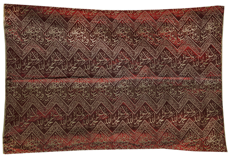 A RED FRAGMENT OF RAWDAH AL-MUTAHARAH CLOTH, EGYPT, 20TH CENTURY