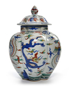 A CHINESE WUCAI LOBBED JAR AND COVER