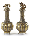 A PAIR OF GILT SILVER VASES WITH COVERS, TURKEY, 19TH CENTURY