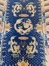 A CHINESE DRAGON RUG, EARLY 20TH CENTURY