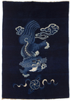 A CHINESE FOO DOG PEKING RUG, 1920