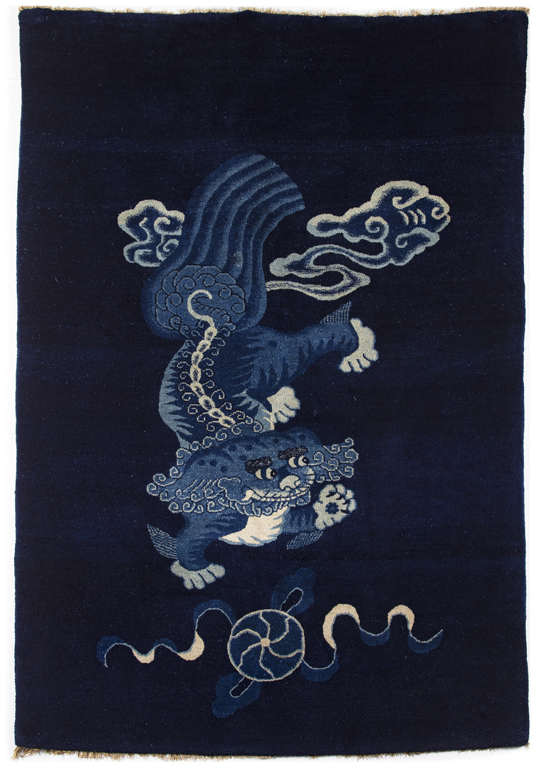 A CHINESE FOO DOG PEKING RUG, 1920