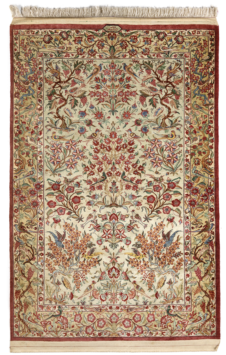 A SIGNED GHOM SILK RUG, IRAN 1920