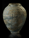 A POST SASSANIAN TURQUOISE GLAZED POTTERY STORAGE JAR, IRAN OR IRAQ, 7TH-8TH CENTURY