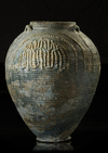 A POST SASSANIAN TURQUOISE GLAZED POTTERY STORAGE JAR, IRAN OR IRAQ, 7TH-8TH CENTURY