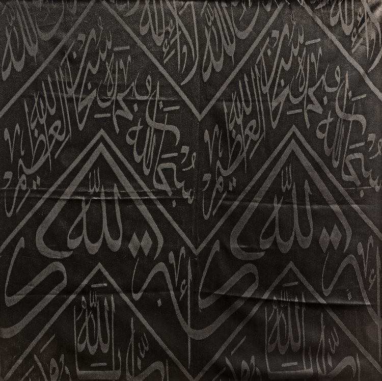 A BLACK KAABA KISWAH TEXTILE FRAGMENT, CIRCA 1930