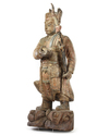 A CHINESE PAINTED AND LACQUERED WOOD FIGURE OF A GUARDIAN, LATE MING DYNASTY (1368-1644)