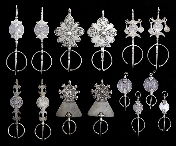 SEVEN PAIRS OF SILVER FIBULA, MOROCCO AND ALGERIA, 19TH AND EARLY 20TH CENTURY