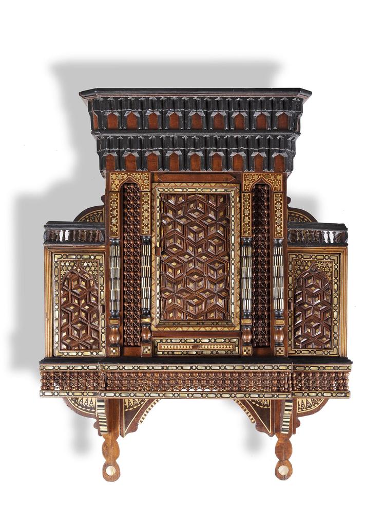 AN EGYPTIAN MOTHER-OF-PEARL INLAID WOOD ARCHITECTURAL WALL BRACKET, LATE 19TH CENTURY