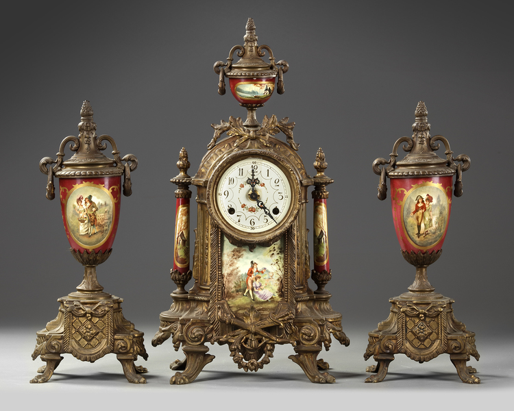 A SPELTER AND RED PORCELAIN CLOCK SET, 19TH CENTURY