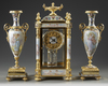 A FRENCH ORMOLU AND PORCELAIN CLOCK GARNITURE, 19TH CENTURY