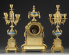 A FRENCH ORMOLU AND BLUE PORCELAIN CLOCK SET, 19TH CENTURY