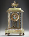 A FRENCH BRONZE AND CHAMPLEVÉ ENAMEL MANTEL CLOCK, 19TH  CENTURY