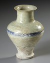 A RAQQA BLUE AND WHITE POTTERY JAR, SYRIA, 13TH CENTURY