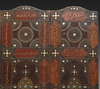 A FOUR PANEL LEATHER SCREEN, DATED 1346 AH /1927-28 AD