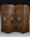 A FOUR PANEL LEATHER SCREEN, DATED 1346 AH /1927-28 AD