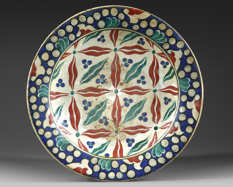 An Iznik Style Polychrome Pottery Dish Th Th Century