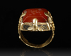 A SELJUK GOLD RING WITH ENGRAVED RED AGATE SEAL, ANATOLIA OR CENTRAL ASIA, 12TH-13TH CENTURY