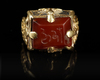 A SELJUK GOLD RING WITH ENGRAVED RED AGATE SEAL, ANATOLIA OR CENTRAL ASIA, 12TH-13TH CENTURY