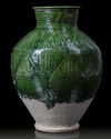 A RARE INTACT FATIMID LEED-GLAZED JAR, EGYPT, 10TH-11TH CENTURY