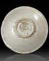 A FINE ABBASID POTTERY BOWL WITH A KUFIC INSCRIPTION, IRAQ, 9TH CENTURY